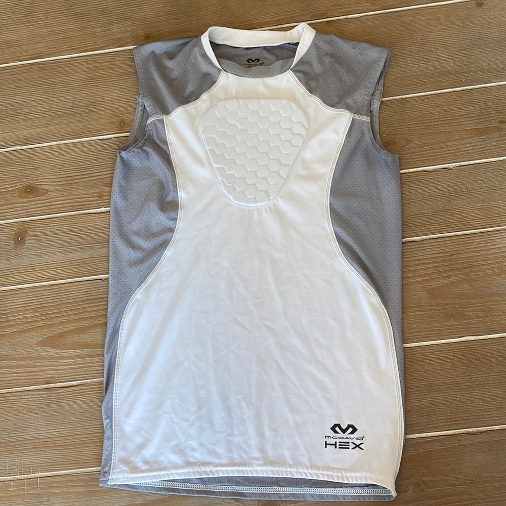 Never worn, Youth L padded chest protector/heart guard shirt for sports